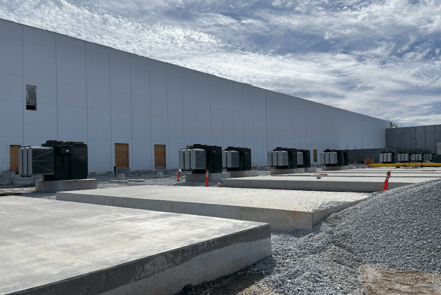 Cost control specialists analyzing dashboards in a meeting room