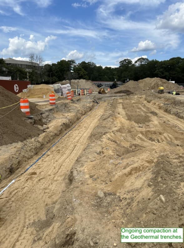 DIJ engineers collaborating with digital models in the office